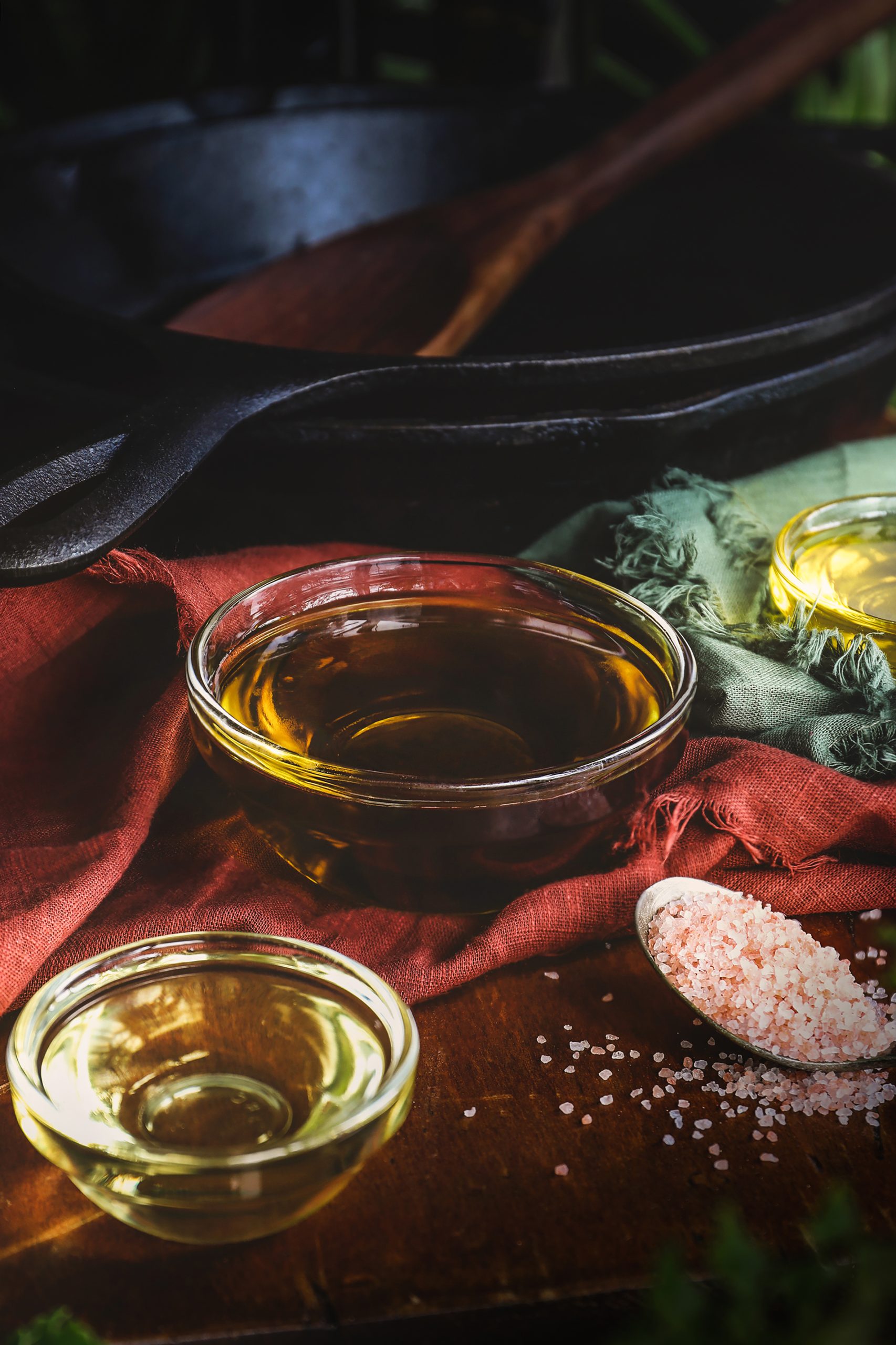 Bowls of oil and pink salt.