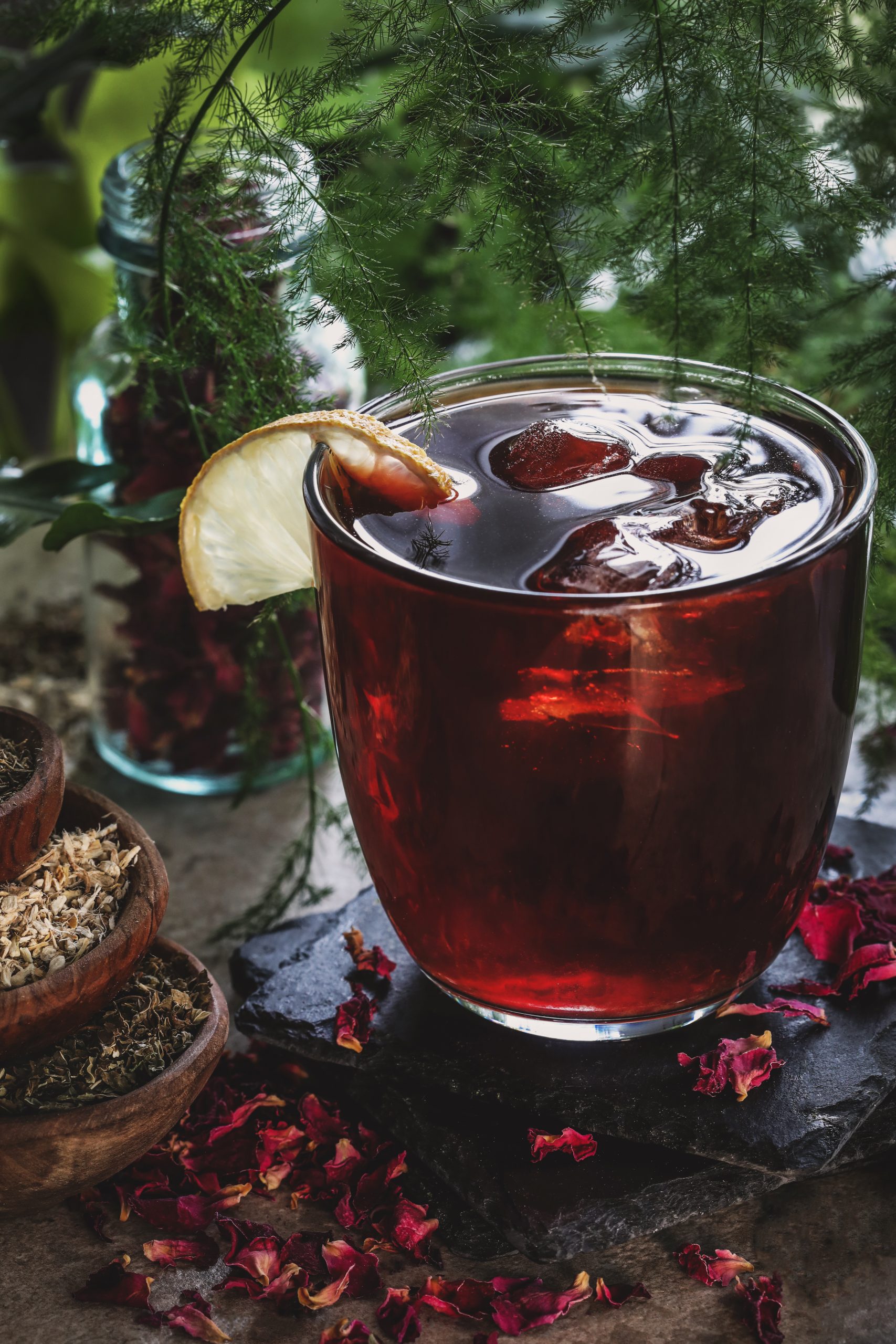 A glass of cold herbal infusion is ready to be drunk