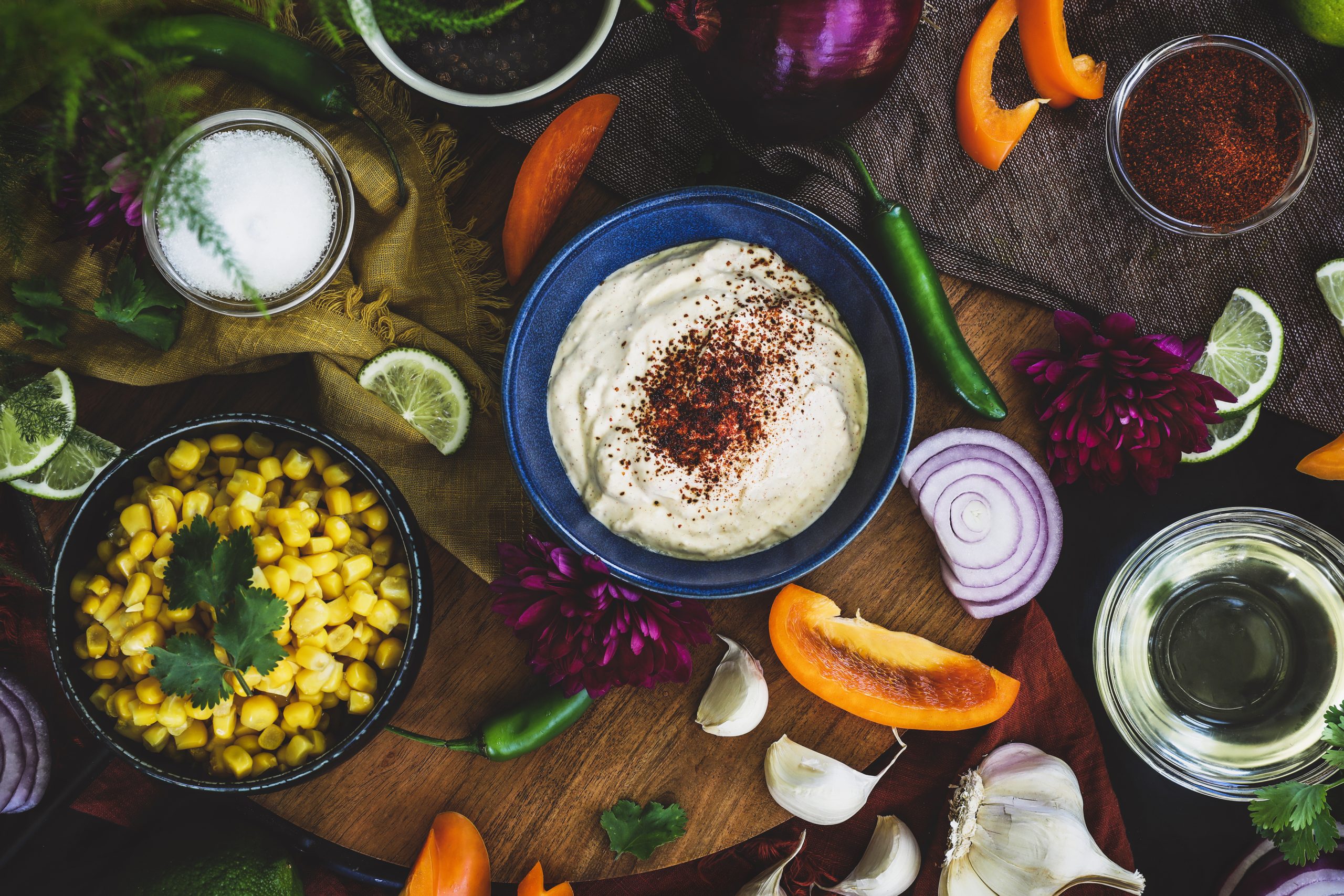 Ingredients for Esquites salad sit out ready to be assembled