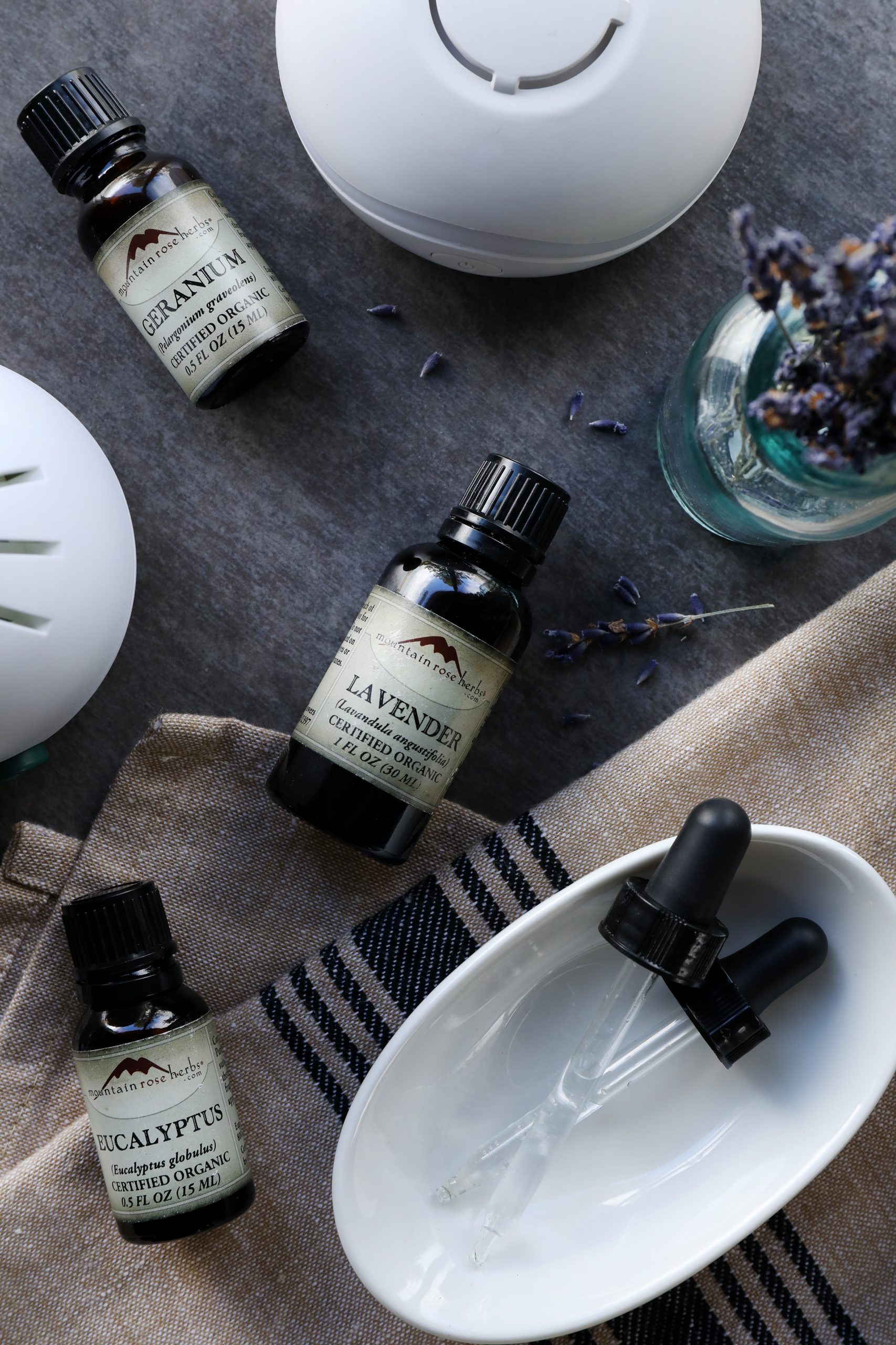 Essential oils need to be properly diluted when making skin care products. Use this dilution chart to make accurate and safe dilutions before applying oils to your skin. Organic essential oils like lavender, geranium, and eucalyptus essential oils can be used in diffusers for home aromatherapy. 