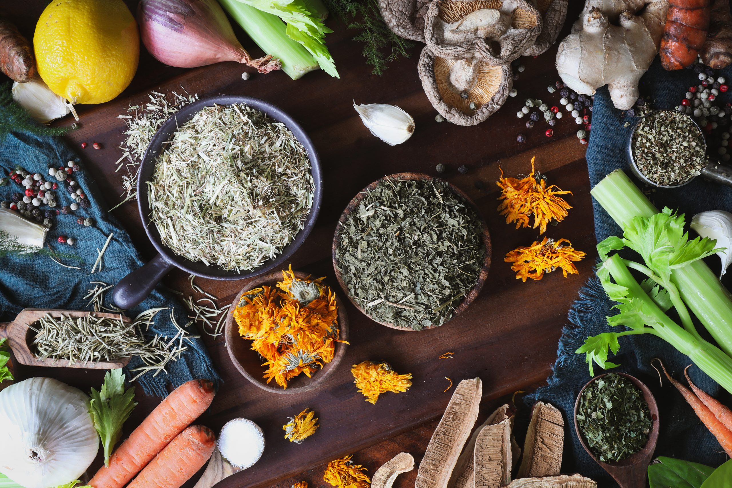 Herbal broth ingredients lay out on cutting board