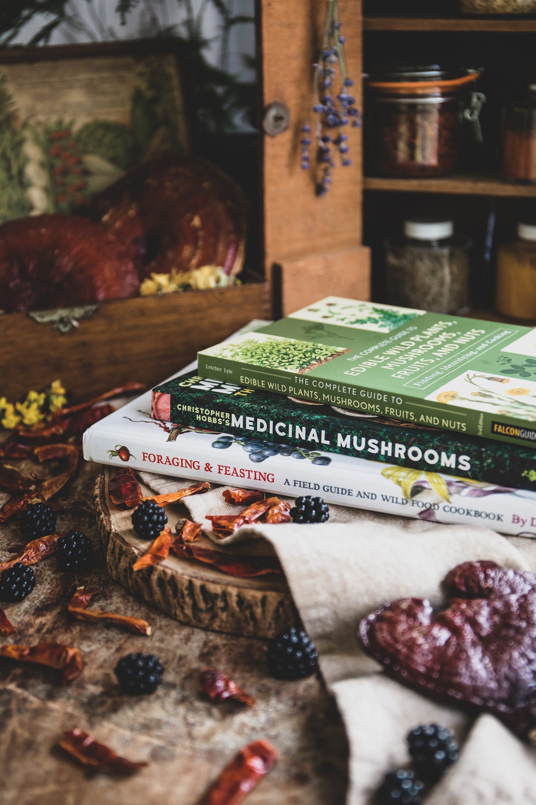 A stack of herbal books