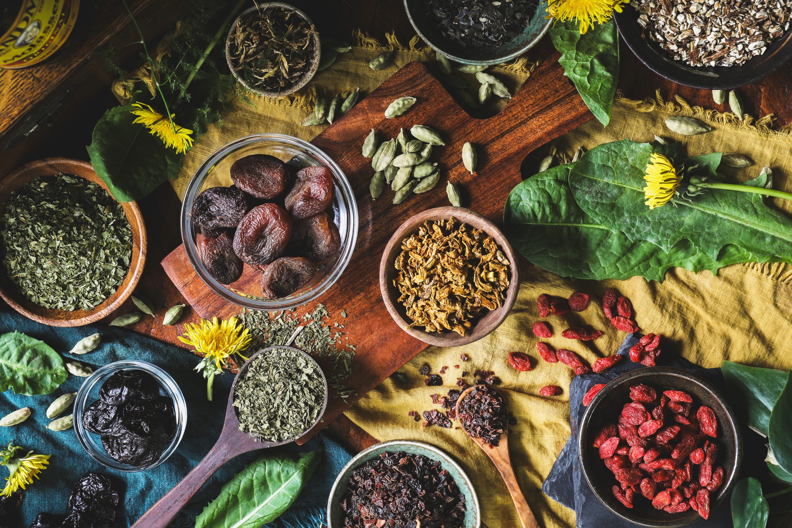 Ingredients for iron tonic lay out in various bowls on a counter top, ready to be be used