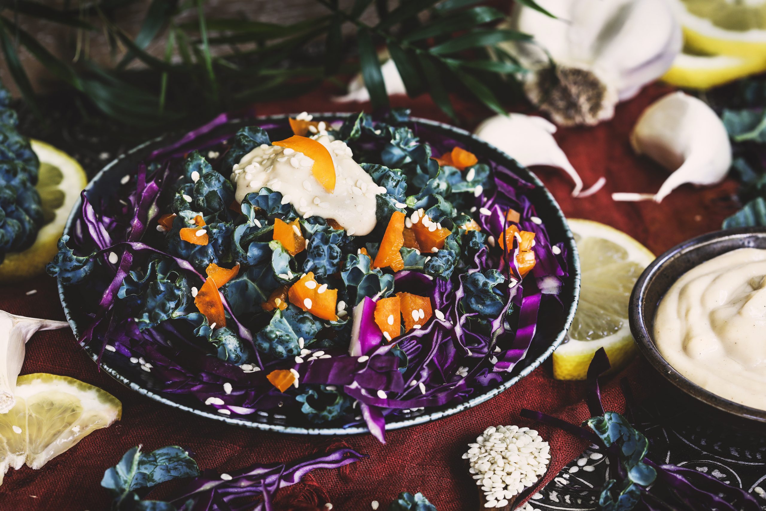 A kale salad with a dollop of tahini dressing