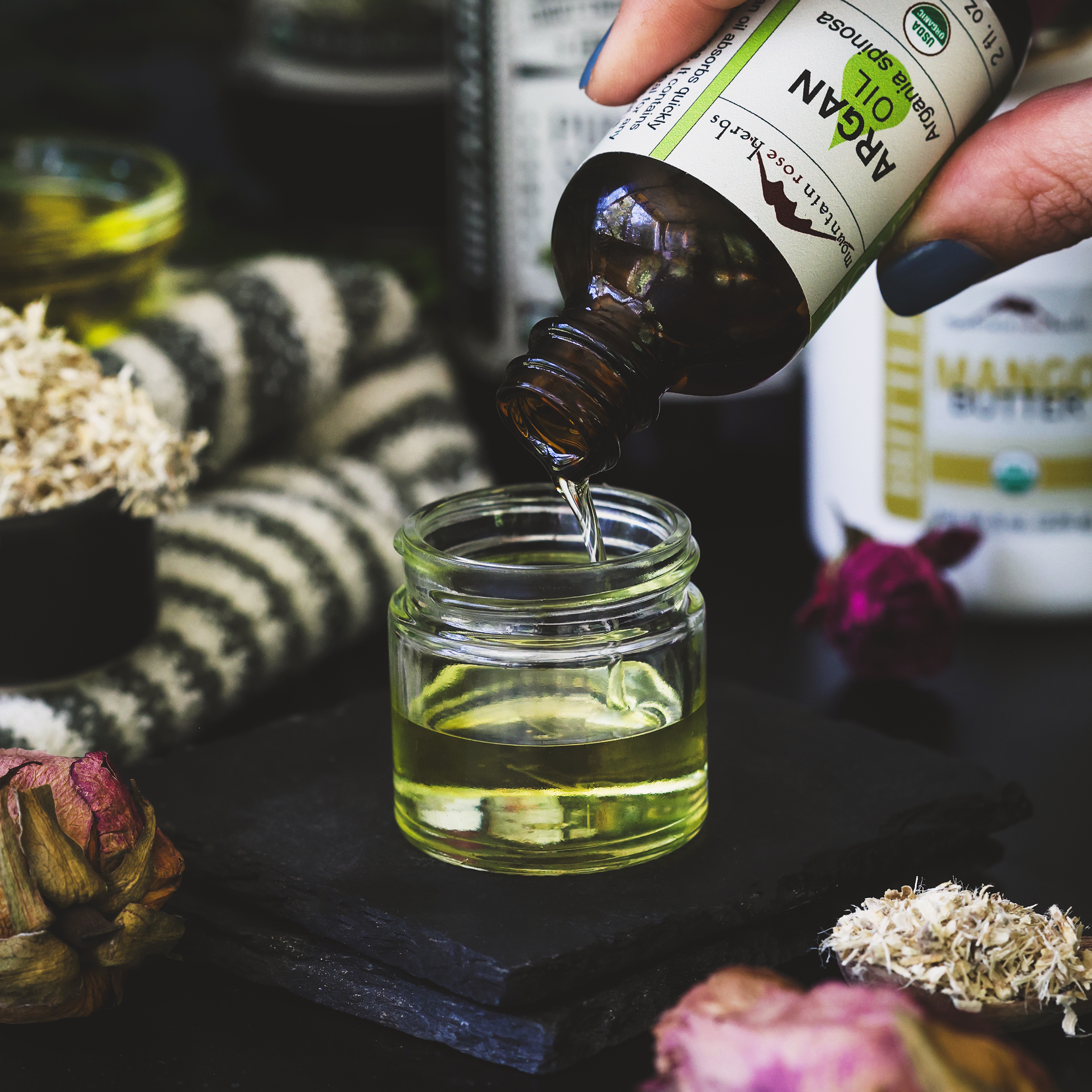 A photo of argan oil being poured into a small dish