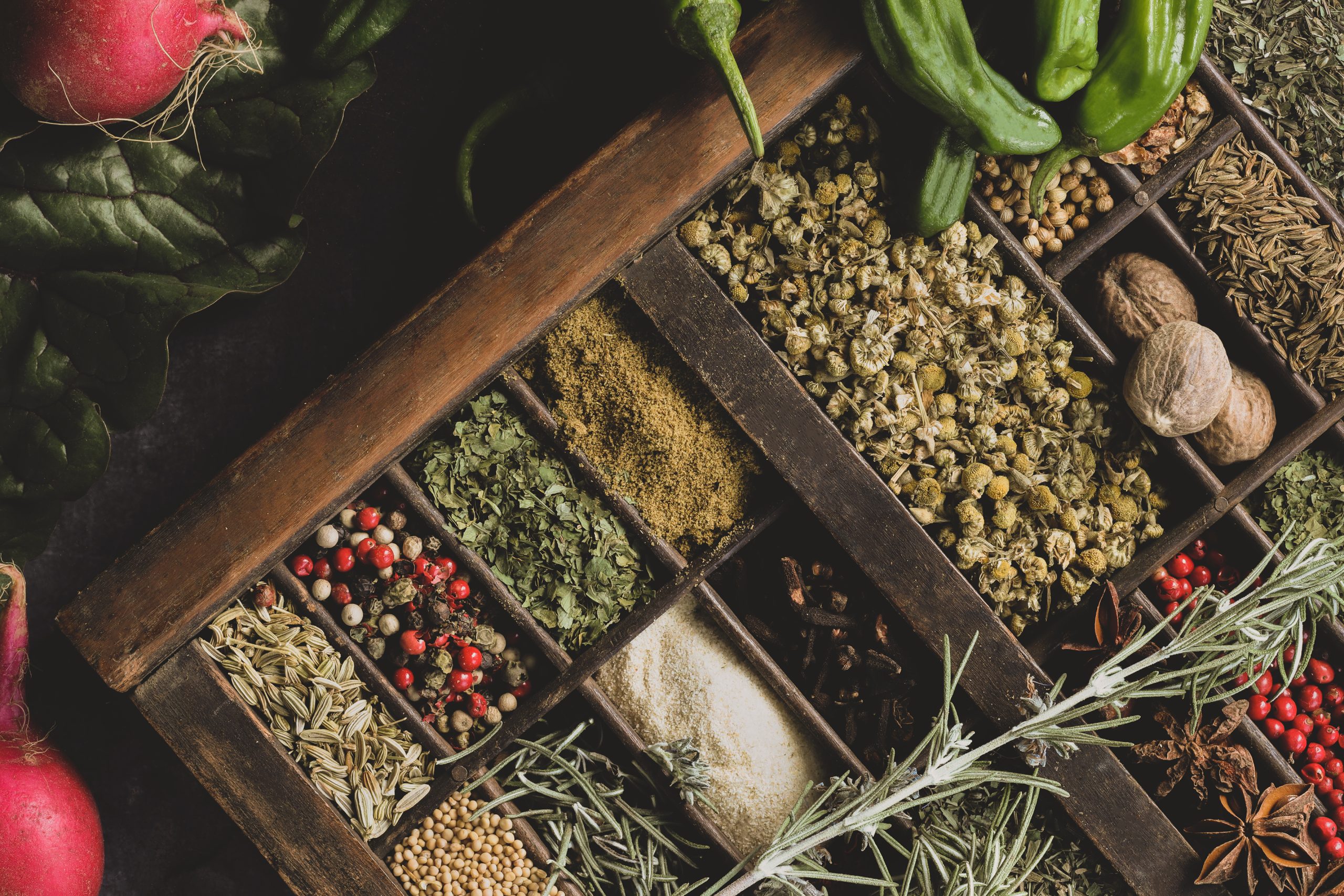 Dried colorful herbs and spices in a beautiful display. 