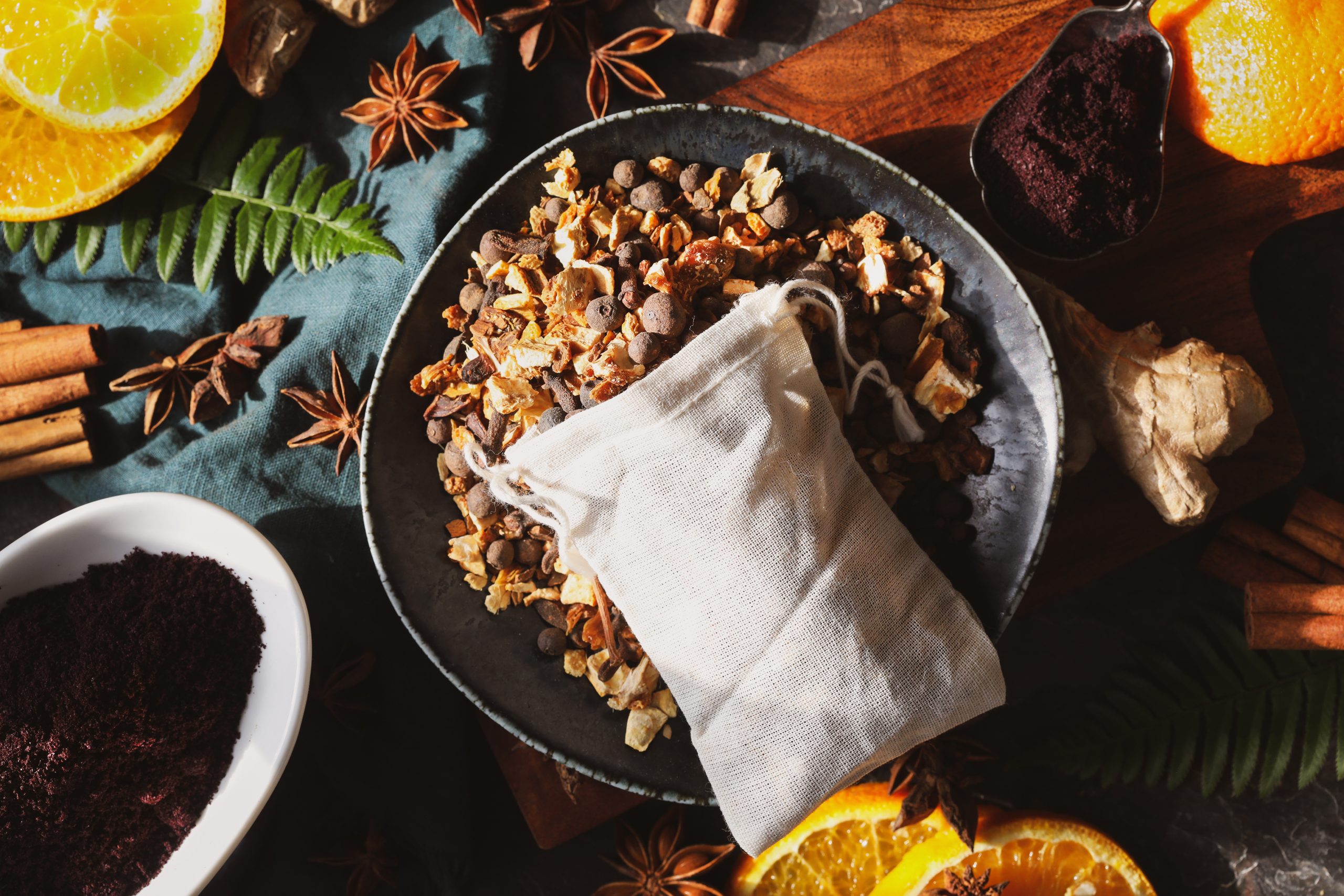 Ingredients for mulled acai cider lay out