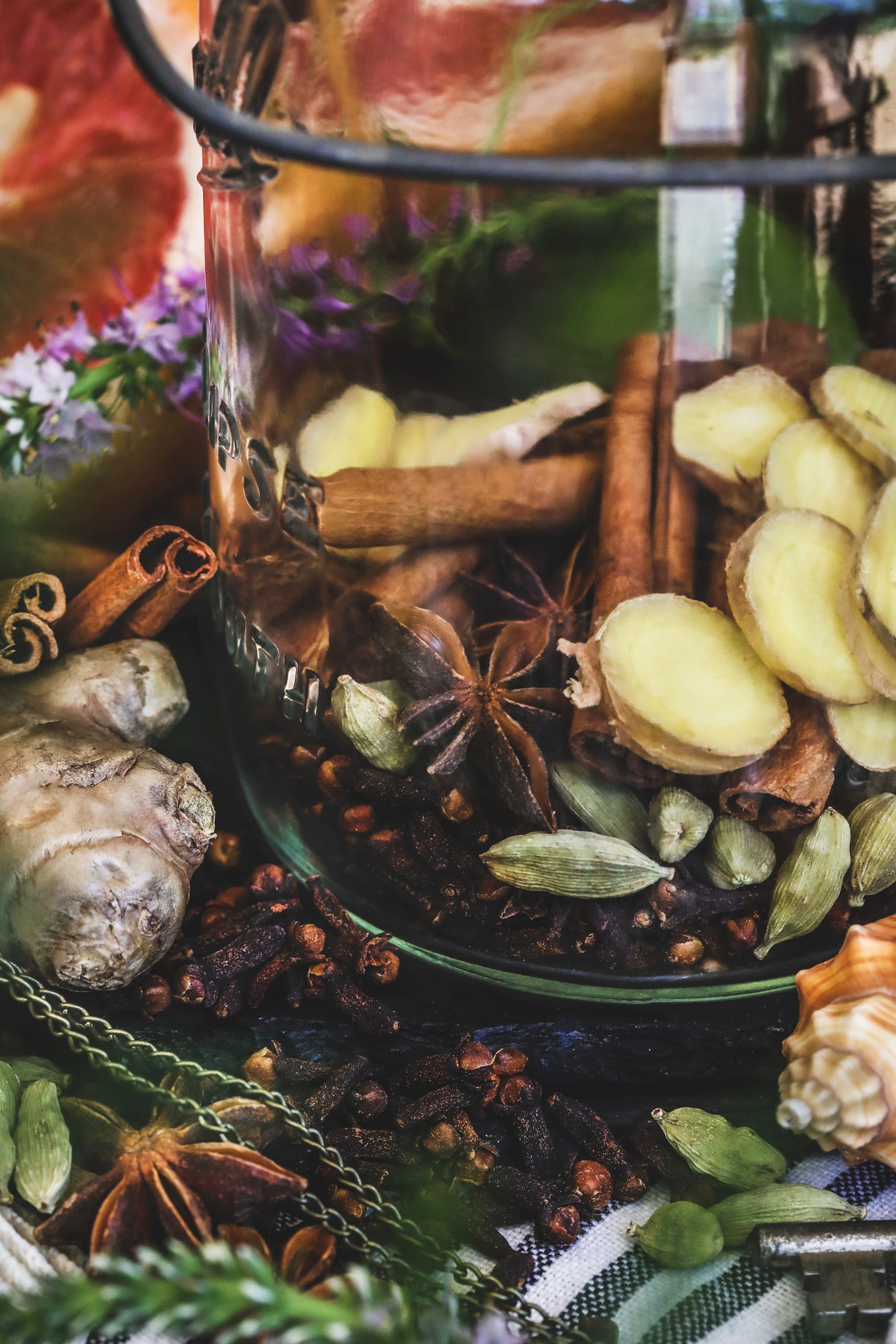 Ingredients for spiced rum sit in a jar
