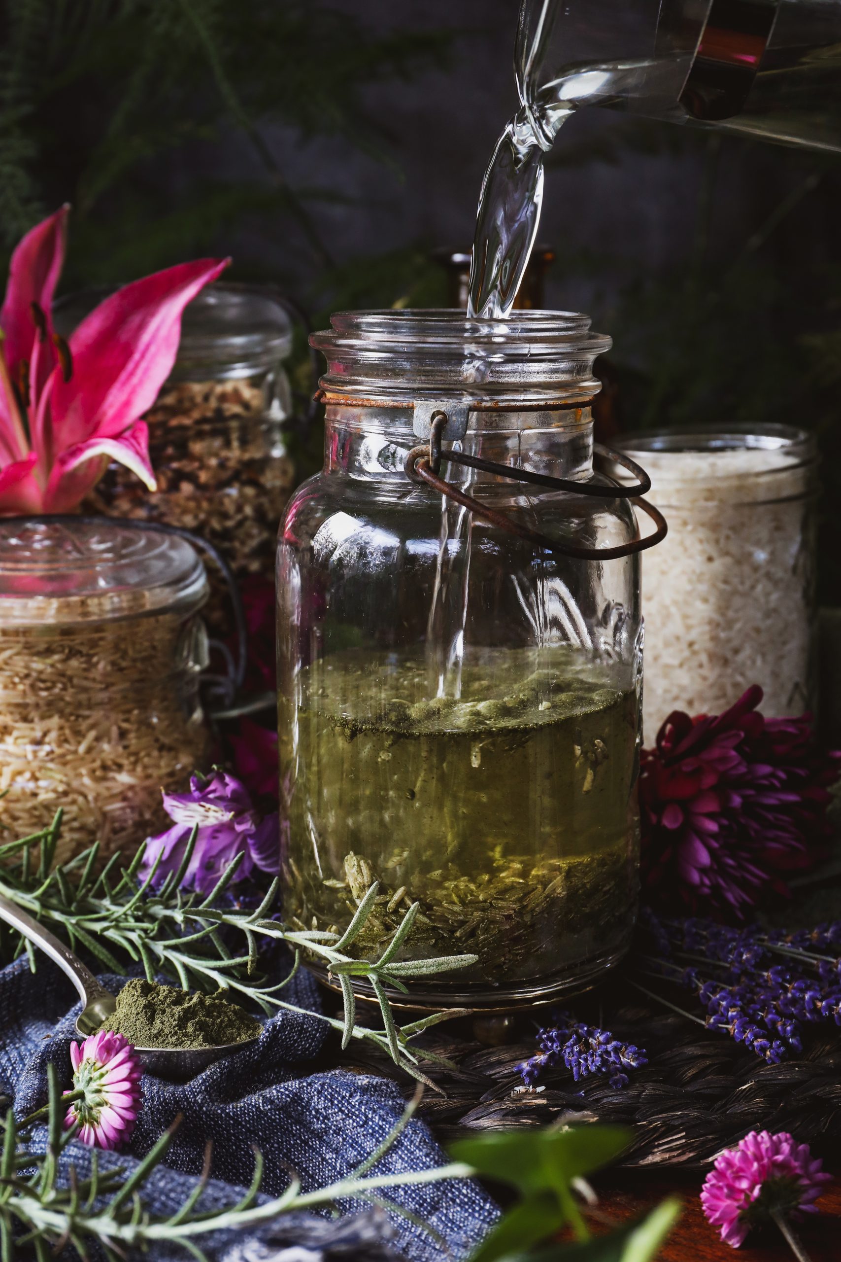 Water poured into jar with rice and herb powder