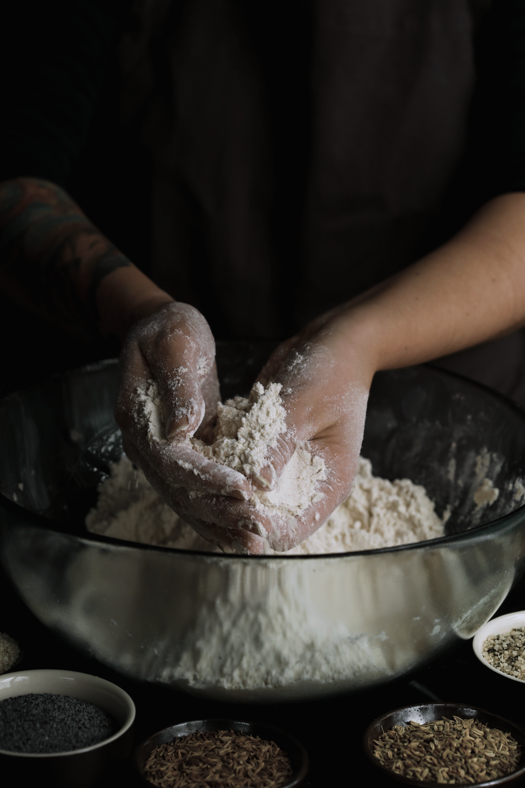 Mixing Irish soda bread dough together in a mixing bowl after adding buttermilk. 