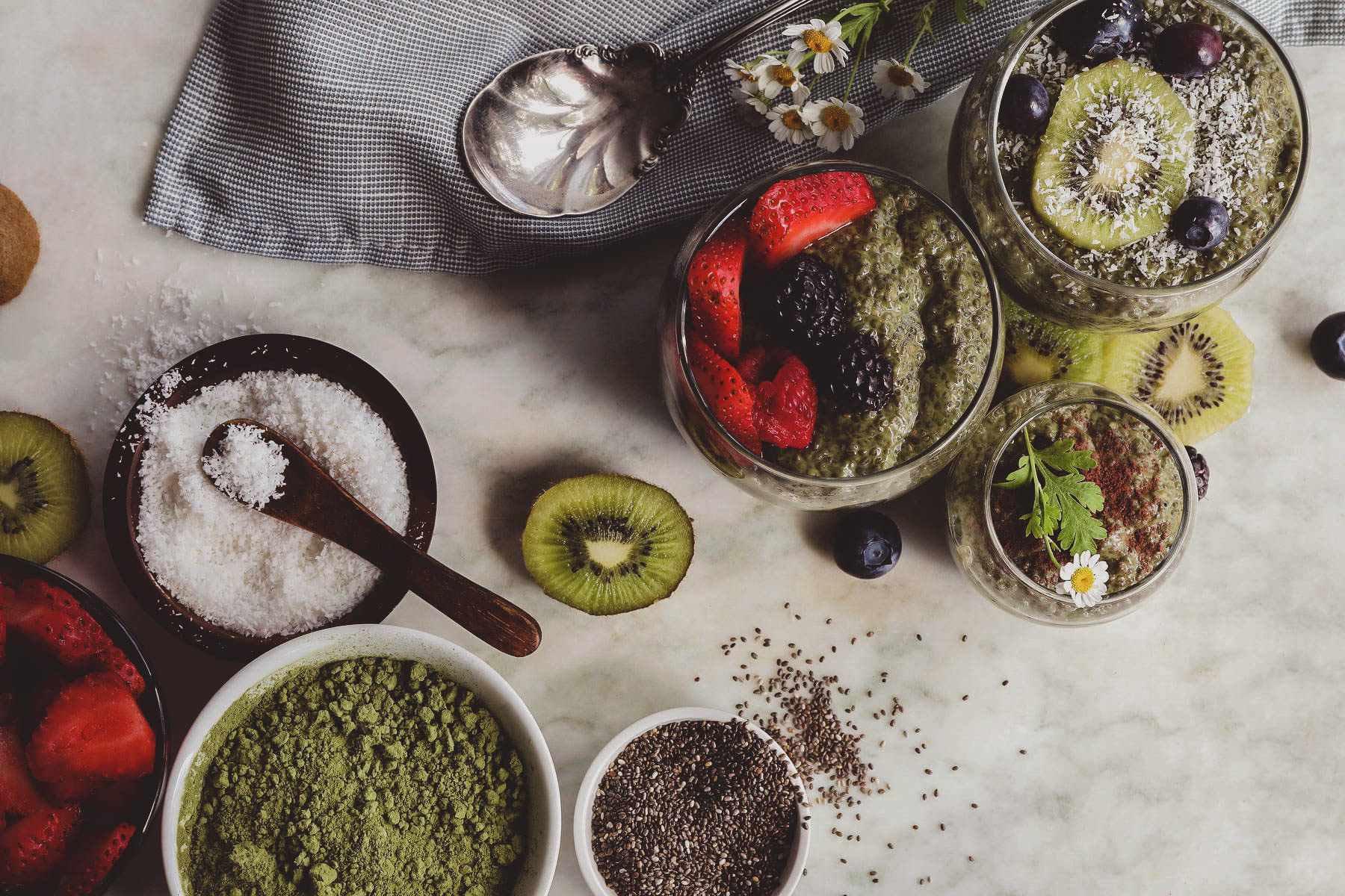 Matcha chia pudding cups with fresh strawberries