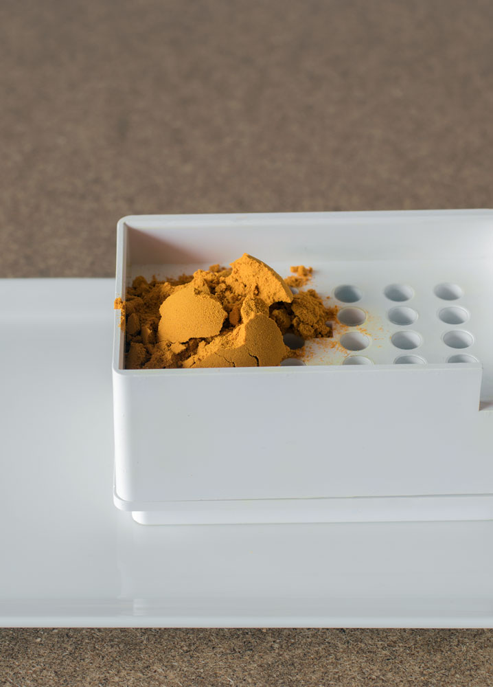 Organic turmeric powder ready for making into herbal capsules