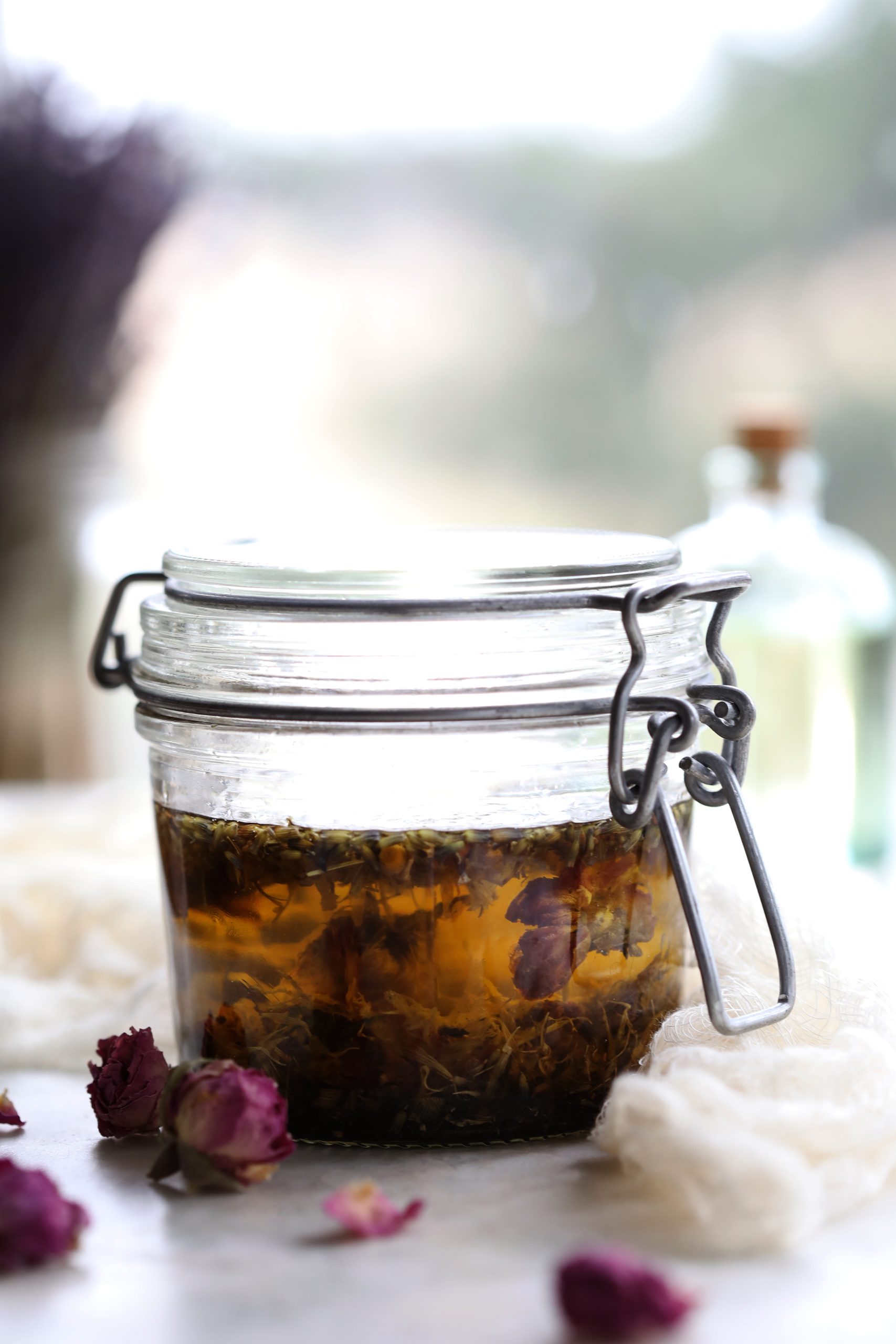 Flowers infusing into oil for baby massage.