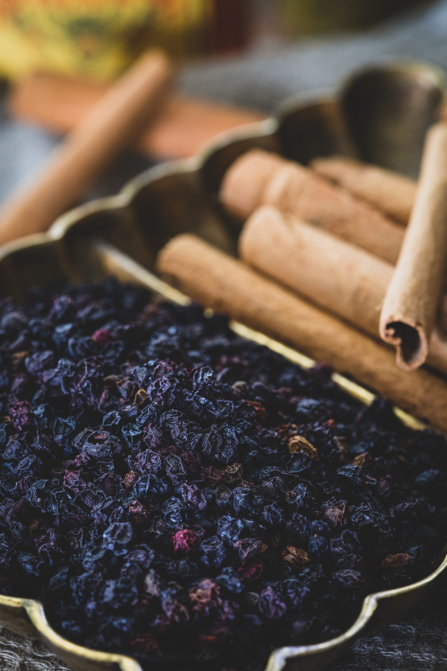 Bowl of elderberries and cinnamon. 