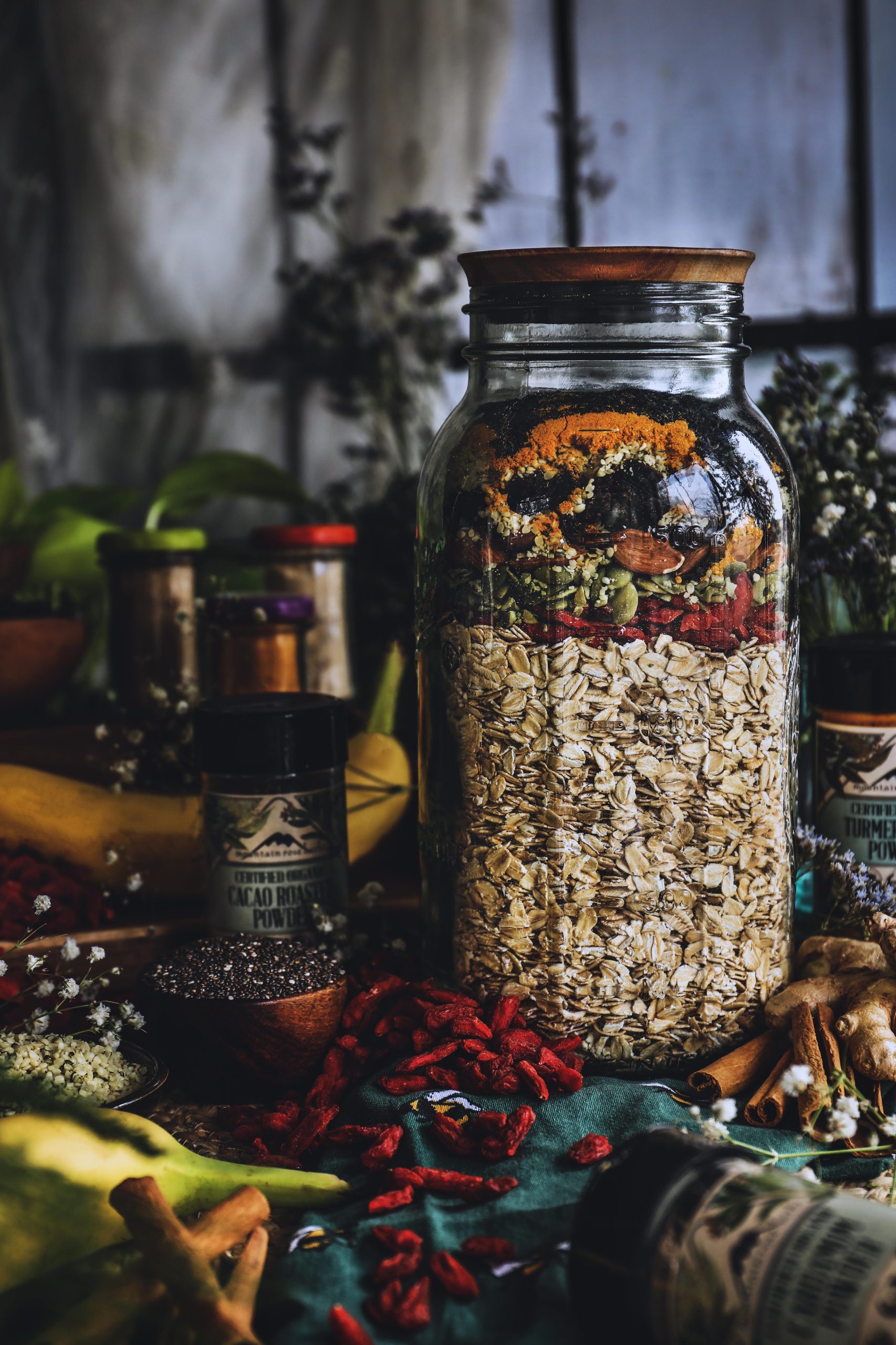 A jar of dried oatmeal ingredients is ready to be blended