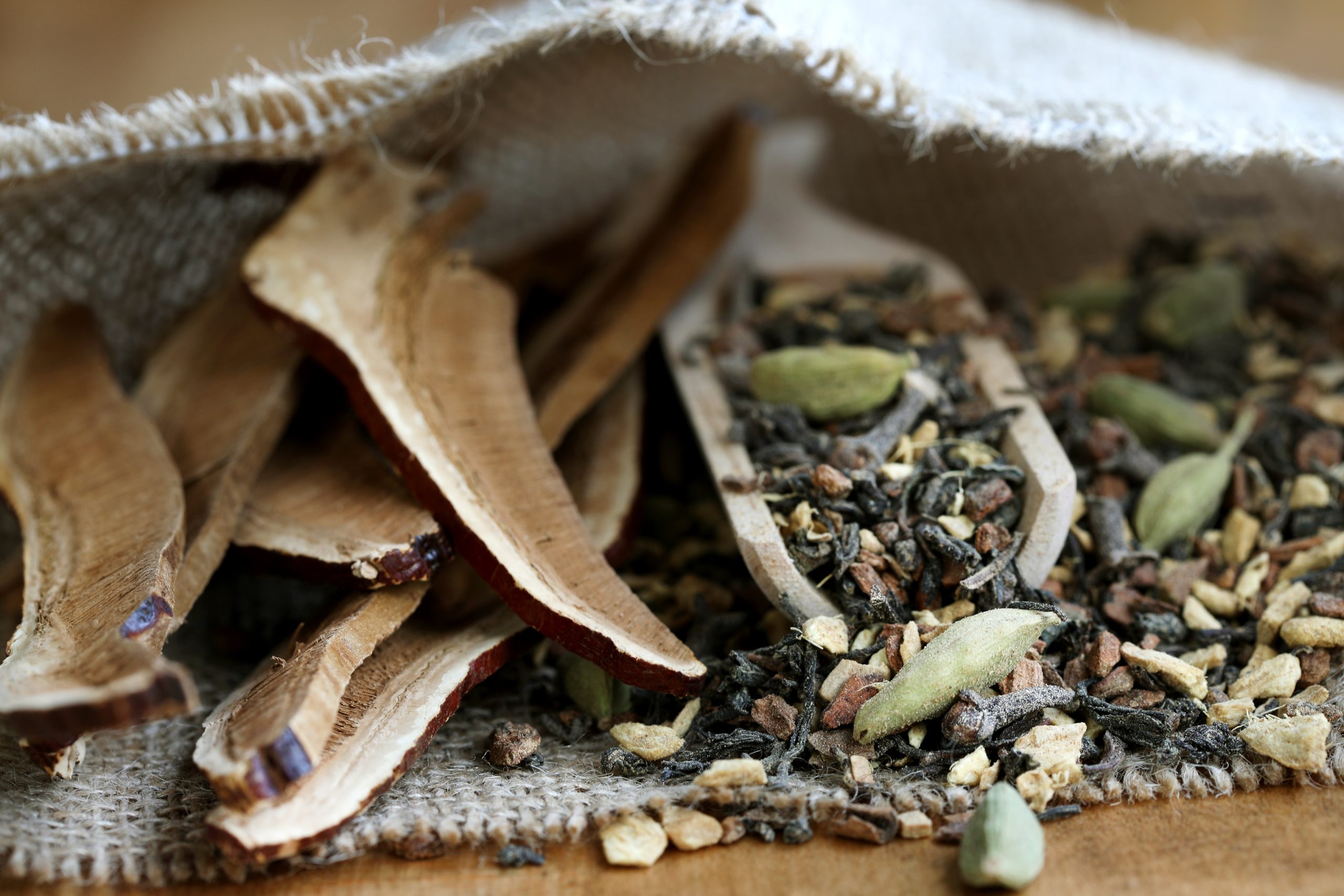 Cotton bag of chai ingredients and reishi mushroom slices