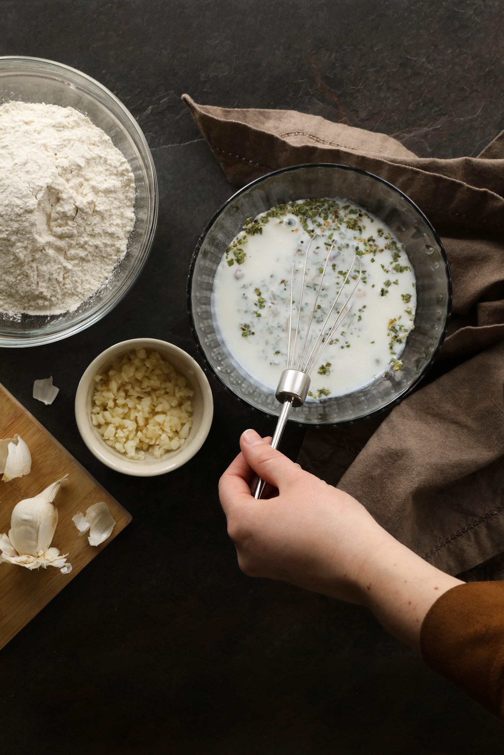 Preparing ingredients for herbal spring nettle biscuits. 