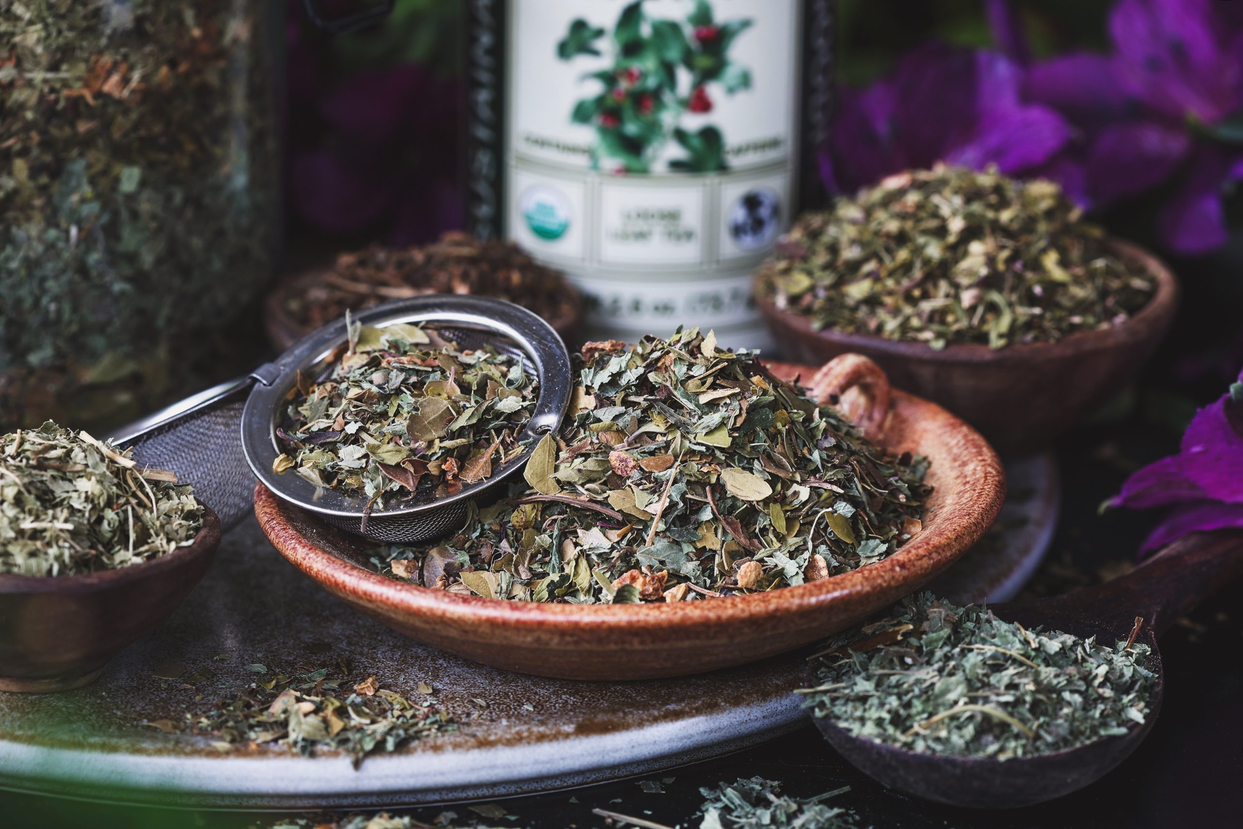 An herbal tea blend for mood support with a tea strainer in it
