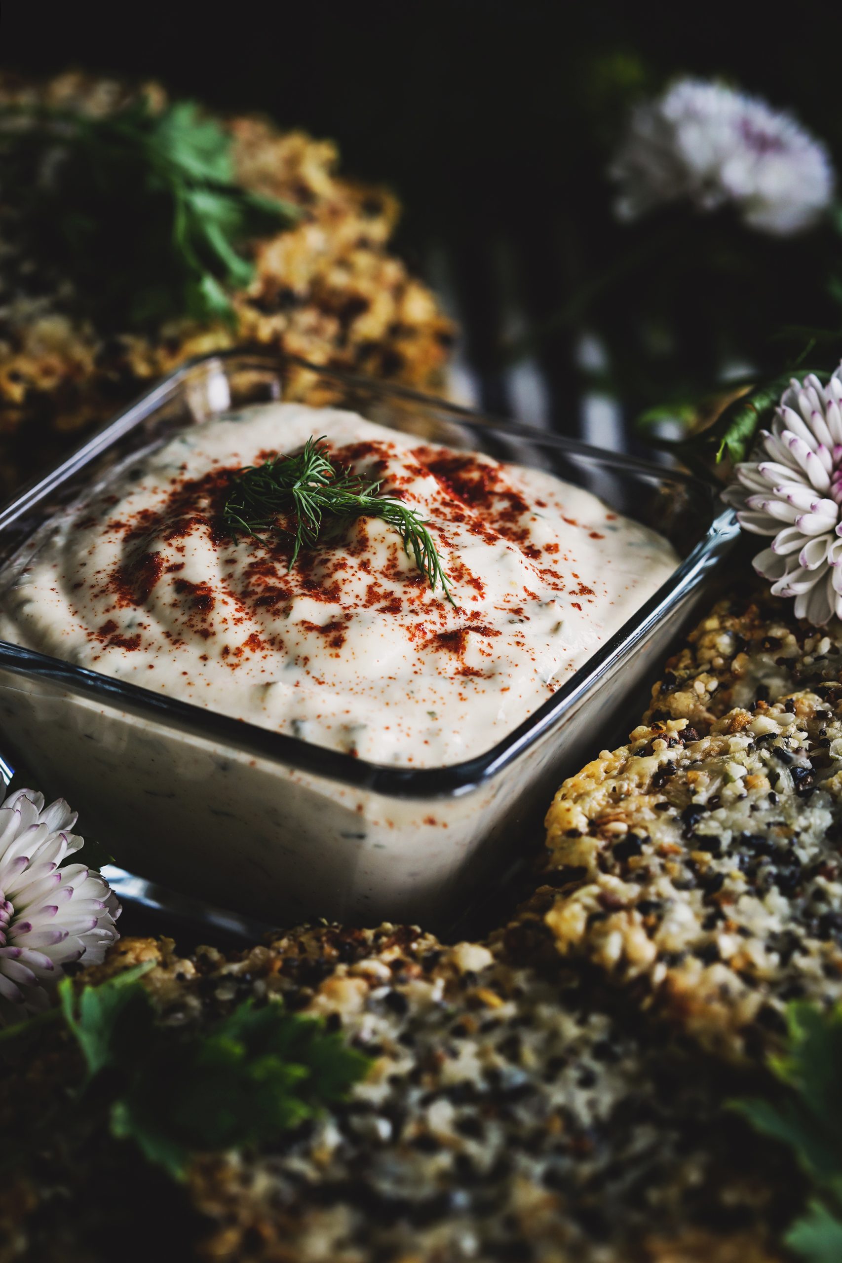 Gluten free seed crackers with a vegan cashew sour cream.